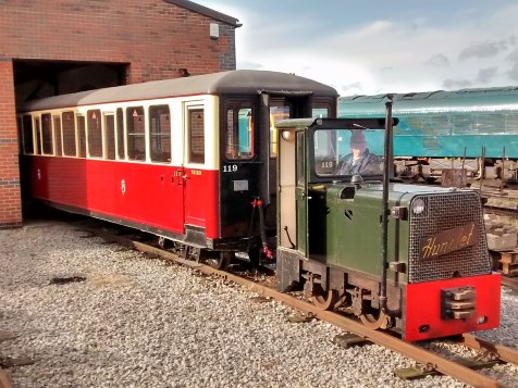image:- Carriage 119 hauled by AD34, leaving the Running Shed