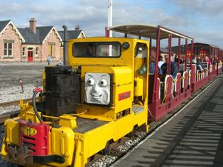 image:- Campbells hauling a passenger train at the March Thomas
            Event leaving Butterley Park Station